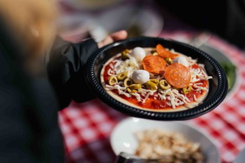 close up of personal pizza on plate