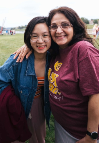 Female student posing with International Director