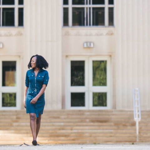 Two females walking out of Riggleman Hall