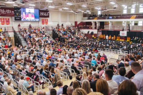 side view of graduation in the arena