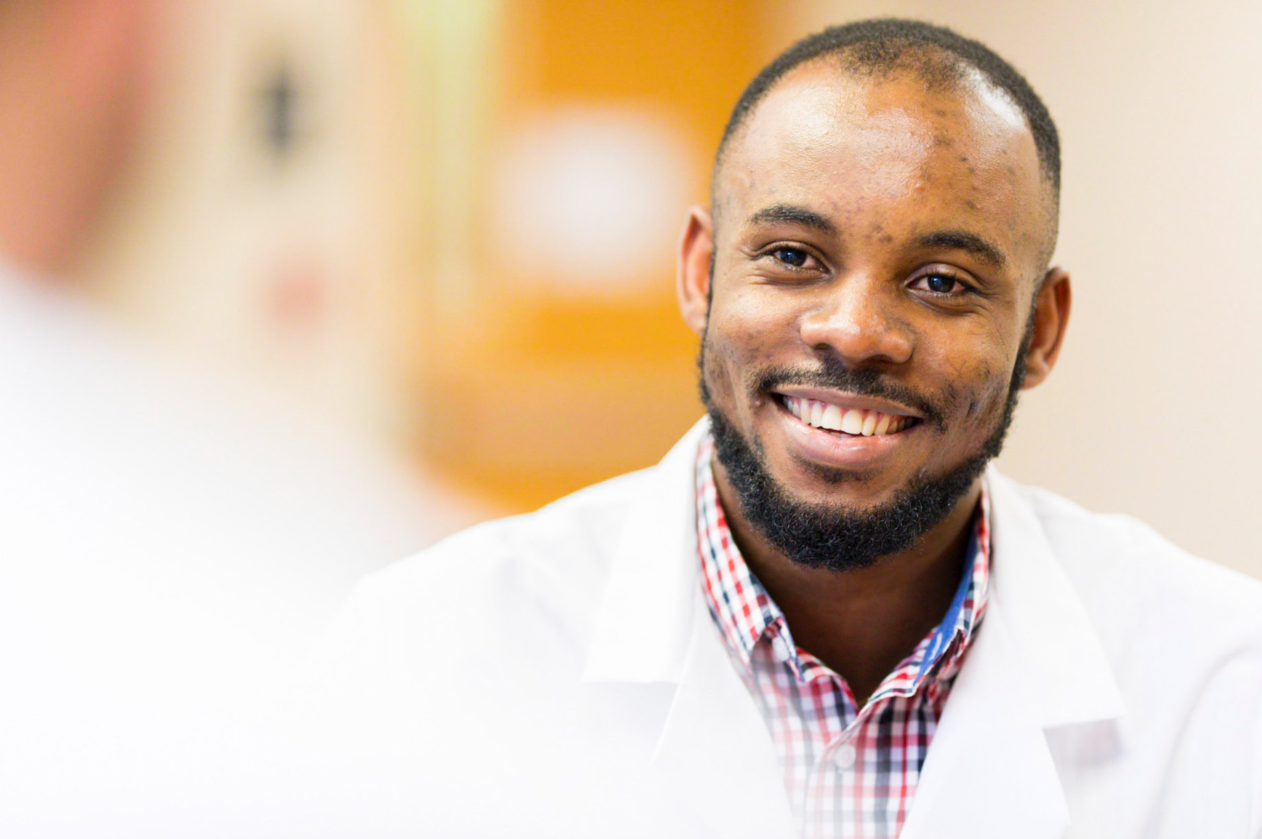 smiling male pharmacy student