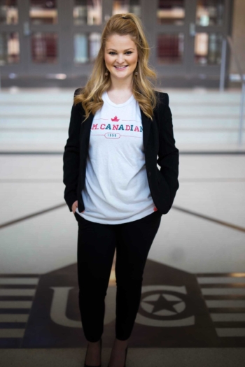 Smiling female standing in Innovation Center Lobby